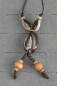 Preview: Afrikanische Halskette - Schmuck mit Kauri Muscheln - Rückseite