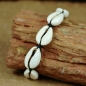 Preview: Schönes Afrika Armband mit Kauri Muscheln